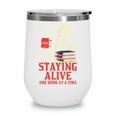 Staying Alive One Book At A Time Skeleton Reading Librarian Wine Tumbler