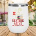Staying Alive One Book At A Time Skeleton Reading Librarian Wine Tumbler