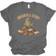 Unearth a Story Dinosaur Reading Books Summer 2026 Unisex Jersey T-Shirt