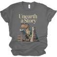Unearth A Story Dinosaur Reading a Library Book Unisex Jersey T-Shirt