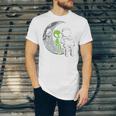 Astronaut Reading Book To Alien Moon Space Women Kids Men Premium Tri-Blend Unisex Jersey T-Shirt