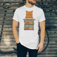 Cute Orange Tabby Cat Reading On Pile Of Books Unisex Jersey T-Shirt Cute Orange Tabby Cat Reading On Pile Of Books Unisex Jersey T-Shirt