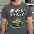 Unearth a Story Frog Reading a Book Summer 2026 Unisex Jersey T-Shirt Unearth a Story Frog Reading a Book Summer 2026 Unisex Jersey T-Shirt
