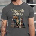 Women's Unearth A Story Dinosaur Reading a Library Book Unisex Jersey T-Shirt