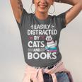 Easily Distracted By Cats And Books Cute Cat And Book Lovers Unisex Jersey T-Shirt Easily Distracted By Cats And Books Cute Cat And Book Lovers Unisex Jersey T-Shirt