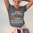 Most Likely To Read A Book On Christmas Family Matching Xmas Unisex Jersey T-Shirt Most Likely To Read A Book On Christmas Family Matching Xmas Unisex Jersey T-Shirt