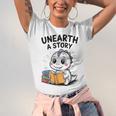 Unearth a Story Cute Dinosaur Summer Reading 2026 Dino Book Unisex Jersey T-Shirt Unearth a Story Cute Dinosaur Summer Reading 2026 Dino Book Unisex Jersey T-Shirt