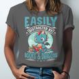 Easily Distracted By Books And Dragons Nerds Unisex Jersey T-Shirt Easily Distracted By Books And Dragons Nerds Unisex Jersey T-Shirt