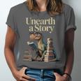 Unearth A Story Dinosaur Reading a Library Book Unisex Jersey T-Shirt