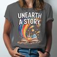Unearth A Story Rainbow Treasure Book Unisex Jersey T-Shirt Unearth A Story Rainbow Treasure Book Unisex Jersey T-Shirt