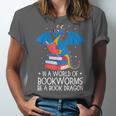 In A World Full Of Bookworms Be A Book Dragon Reading Unisex Jersey T-Shirt In A World Full Of Bookworms Be A Book Dragon Reading Unisex Jersey T-Shirt