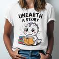 Unearth a Story Cute Dinosaur Summer Reading 2026 Dino Book Unisex Jersey T-Shirt Unearth a Story Cute Dinosaur Summer Reading 2026 Dino Book Unisex Jersey T-Shirt