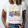 A Woman Cannot Survive On Books Alone She Needs Yarn Crochet Premium Tri-Blend Unisex Jersey T-Shirt