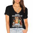 Easily Distracted By Cats And Books Book Lover Cat Women's Jersey Short Sleeve Deep V-Neck Tshirt