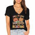 Fall In Love With Reading Autumn Pumpkin Teacher Book Lover Women's Jersey Short Sleeve Deep V-Neck Tshirt