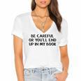 Be Careful Or You’Ll End Up In My Book Women's Jersey Short Sleeve Deep V-Neck Tshirt