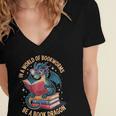 In A World Of Bookworms Be A Book Dragon Women's Jersey Short Sleeve Deep V-Neck Tshirt