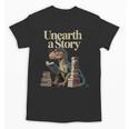 Unearth A Story Dinosaur Reading a Library Book Unisex T-Shirt Unearth A Story Dinosaur Reading a Library Book Unisex T-Shirt
