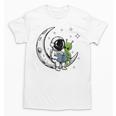 Astronaut Reading Book To Alien Moon Space Astronomy Unisex T-Shirt Astronaut Reading Book To Alien Moon Space Astronomy Unisex T-Shirt