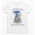A Book A Day Keeps Reality Away Premium Tri-Blend Unisex T-Shirt
