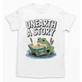 Unearth a Story Frog Reading a Book Summer 2026 Premium Tri-Blend Unisex T-Shirt