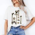 Hip And Leg Bones Book Print Vintage Human Bones Unisex T-Shirt Hip And Leg Bones Book Print Vintage Human Bones Unisex T-Shirt