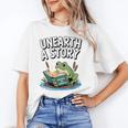 Unearth a Story Frog Reading a Book Summer 2026 Premium Tri-Blend Unisex T-Shirt