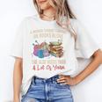 A Woman Cannot Survive On Books Alone She Needs Yarn Crochet Premium Tri-Blend Unisex T-Shirt