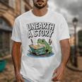 Unearth a Story Frog Reading a Book Summer 2026 Premium Tri-Blend Unisex T-Shirt