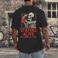 Staying Alive One Book At A Time Skeleton Reading Librarian Men's Back Print T-Shirt