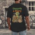 Unearth a Story Triceratops Dinosaur Reading Books Cute Dino Men's Back Print T-Shirt Unearth a Story Triceratops Dinosaur Reading Books Cute Dino Men's Back Print T-Shirt