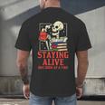 Staying Alive One Book At A Time Skeleton Reading Librarian Men's Back Print T-Shirt
