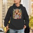 Bookworm Cute Highland Cow Reading Book Unisex Hoodie Bookworm Cute Highland Cow Reading Book Unisex Hoodie