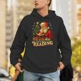 He Sees What You’Ve Been Reading Santa Book Lover Christmas Unisex Hoodie He Sees What You’Ve Been Reading Santa Book Lover Christmas Unisex Hoodie