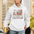 Book Lovers Winter Sleighing Through Stories Tee Premium Tri-Blend Unisex Hoodie