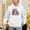 Reading A Book Per Day Keeps Reality Away Skeleton Books Unisex Hoodie