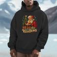 He Sees What You’Ve Been Reading Santa Book Lover Christmas Unisex Hoodie He Sees What You’Ve Been Reading Santa Book Lover Christmas Unisex Hoodie