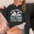Buying A Book And Getting A Little Treat Unisex Hoodie