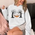 Skeleton Reading Book In Hammock Halloween Reader Unisex Hoodie