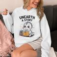 Unearth a Story Cute Dinosaur Summer Reading 2026 Dino Book Unisex Hoodie Unearth a Story Cute Dinosaur Summer Reading 2026 Dino Book Unisex Hoodie
