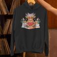 Cute Baby Highland Cow Reading Book Lover Toddler Unisex Hoodie Cute Baby Highland Cow Reading Book Lover Toddler Unisex Hoodie