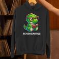 Readasaurus Reading Dinosaur Book Reader Bookworm Unisex Hoodie Readasaurus Reading Dinosaur Book Reader Bookworm Unisex Hoodie