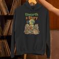 Unearth a Story Triceratops Dinosaur Reading Books Cute Dino Unisex Hoodie Unearth a Story Triceratops Dinosaur Reading Books Cute Dino Unisex Hoodie