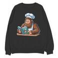 Bigfoot Reading a Cookbook Unisex Sweatshirt