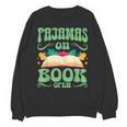 Book And Pajama Pajamas On Book Open Unisex Sweatshirt Book And Pajama Pajamas On Book Open Unisex Sweatshirt