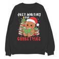 Book Reading Just Waiting For Christmas Gingerbread Unisex Sweatshirt