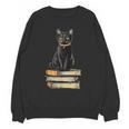Cat Sitting On Books Unisex Sweatshirt