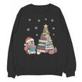 Christmas A Penguin Reading Book Snowflake Cocoa Hot Teacher Unisex Sweatshirt Christmas A Penguin Reading Book Snowflake Cocoa Hot Teacher Unisex Sweatshirt