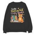 Easily Distracted By Cats And Books Book & Cat Lover Unisex Sweatshirt Easily Distracted By Cats And Books Book & Cat Lover Unisex Sweatshirt
