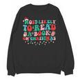 Groovy Christmas Most Likely To Read A Book On Christmas Unisex Sweatshirt Groovy Christmas Most Likely To Read A Book On Christmas Unisex Sweatshirt